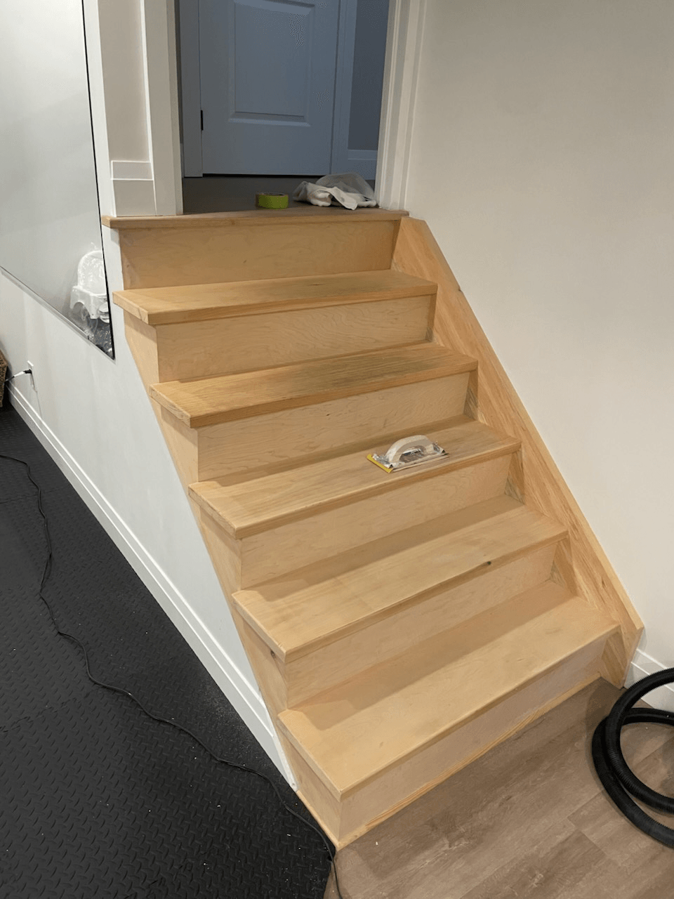 Interior staircase rebuilt & finished — before